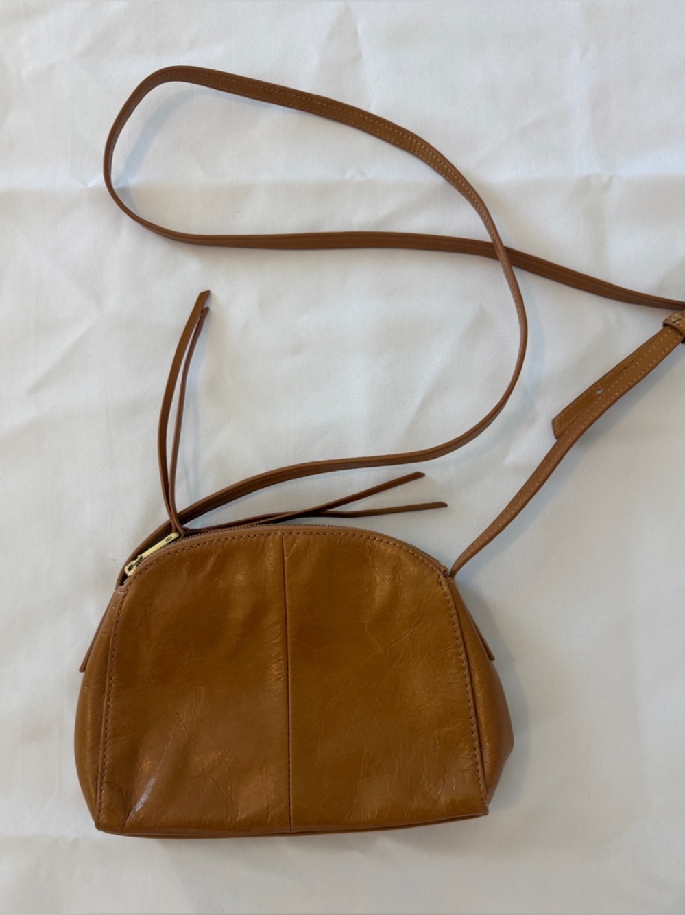 HOBO polished classic tan crossbody bag